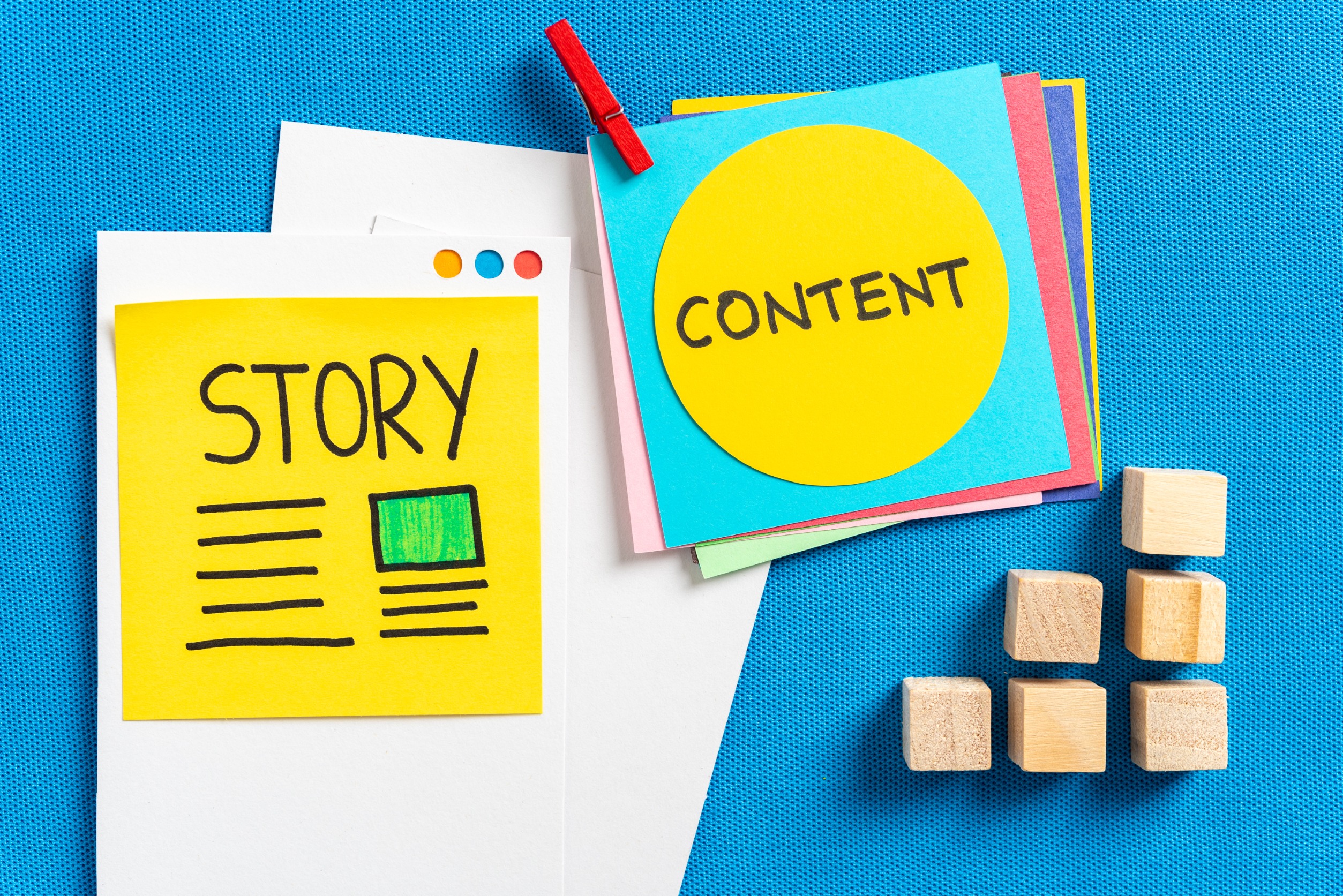 digital marketing concept made with paper cards with the words illustrated "story" and "content"